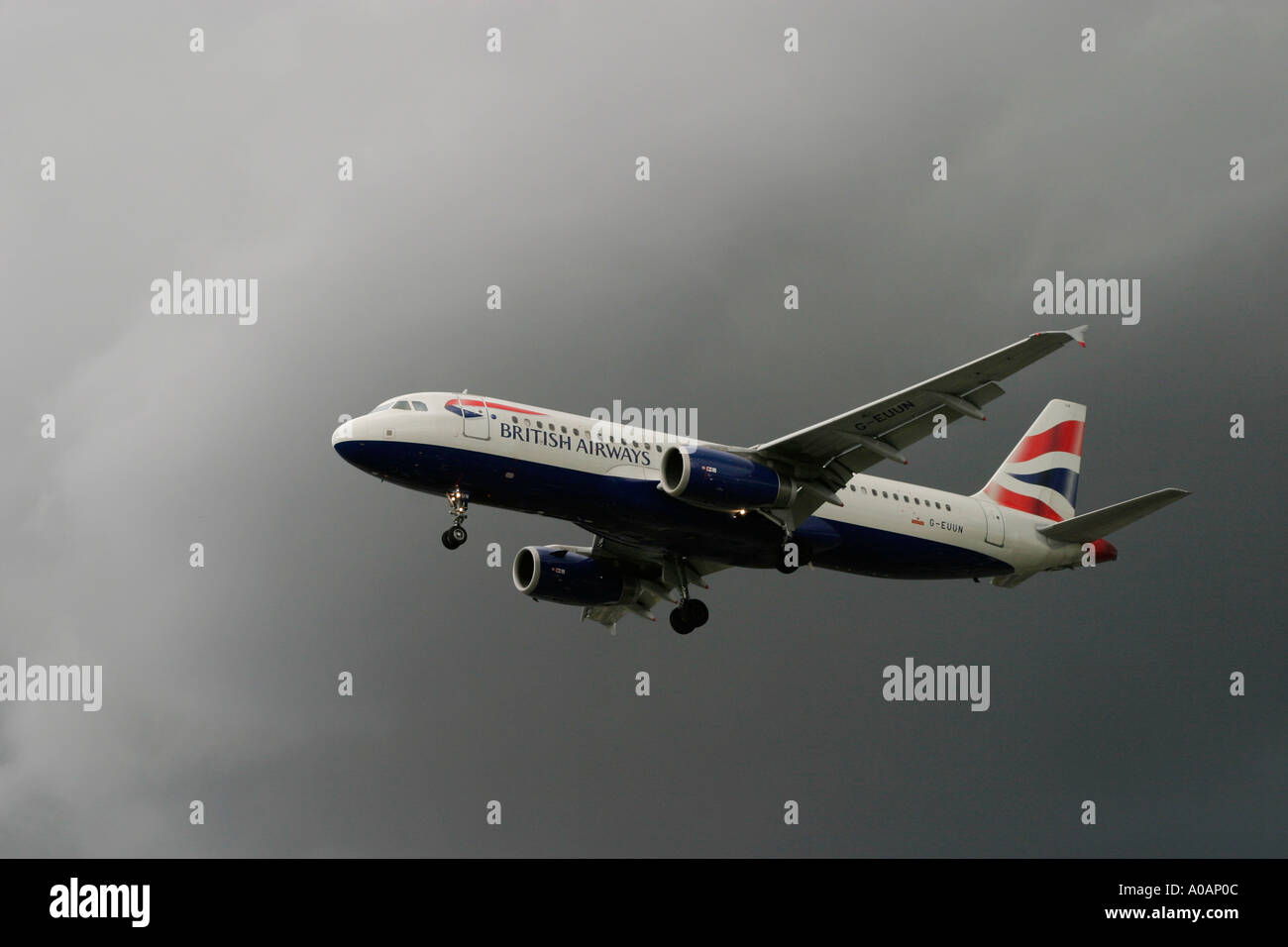 British Airways Airbus A320 flying in a bad weather condition London Heathrow UK Stock Photo