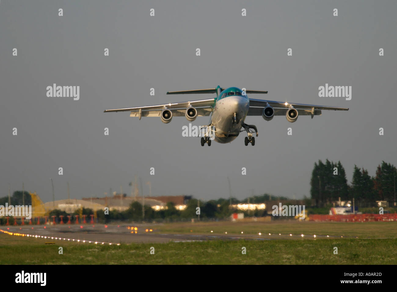 Aer Lingus British Aerospace BAe 146 taking off at London City Airport UK Stock Photo