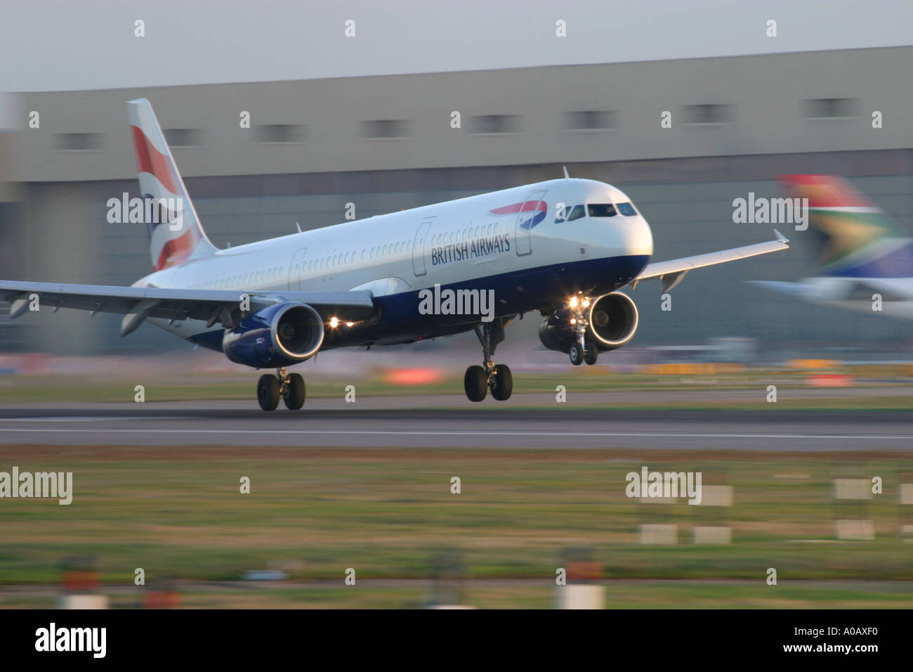 Airbus A321 British Airways landing at London Heathrow LHR EGLL UK England Stock Photo