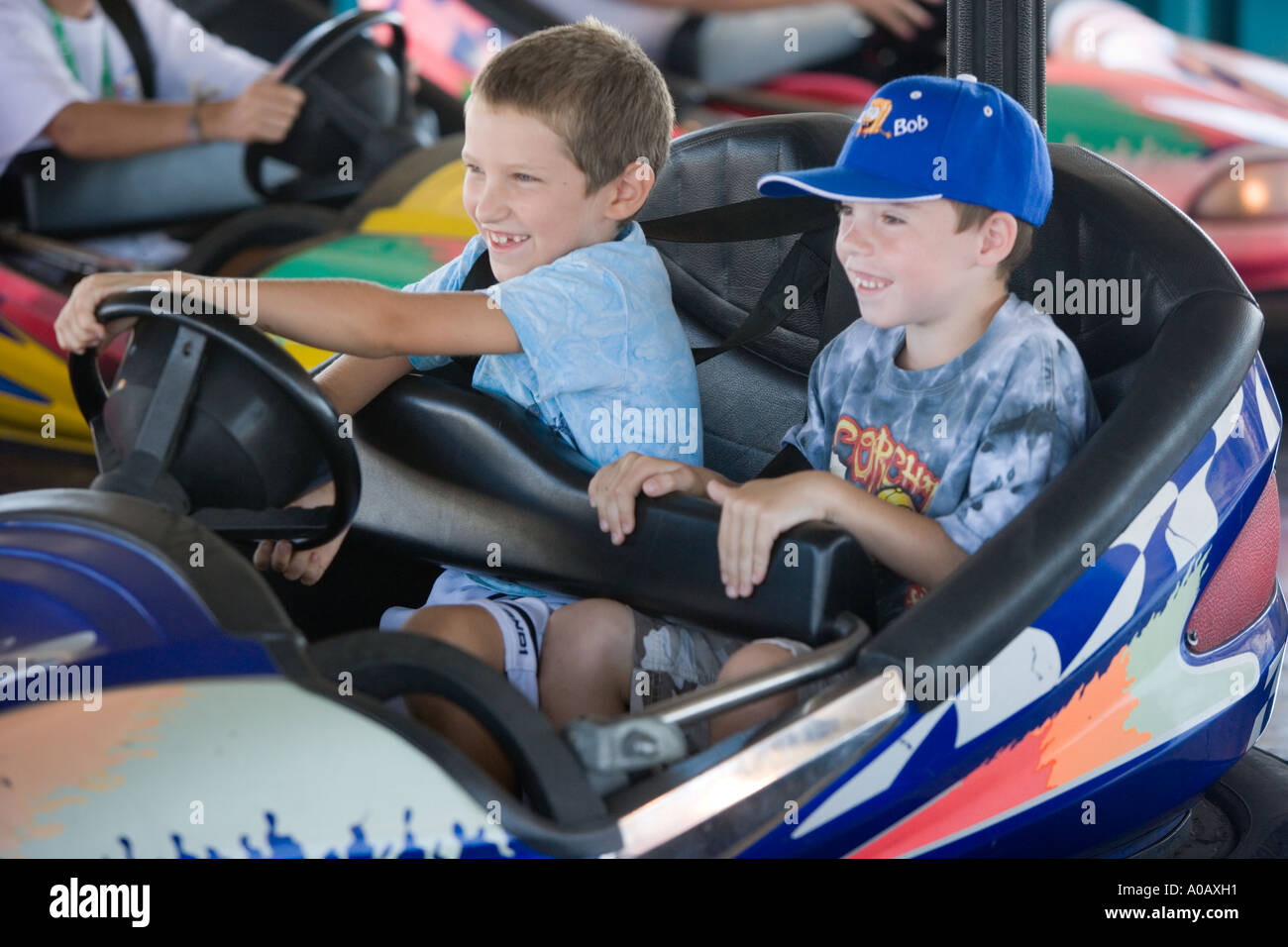 Portrait Caucasian boy on amusement ride at county fair Stock Photo - Alamy