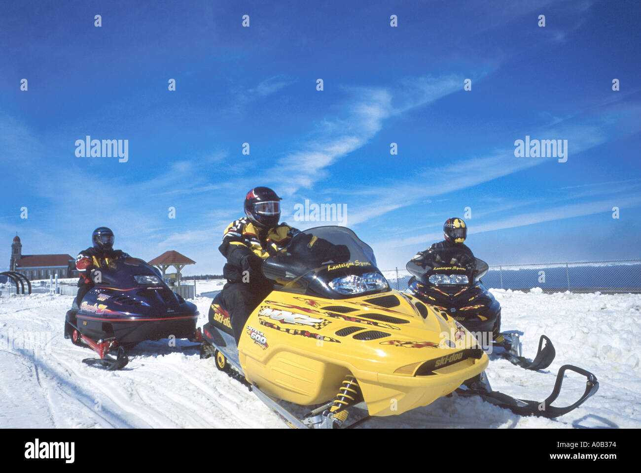 snowmobiles on trail in Eastern Canada Stock Photo