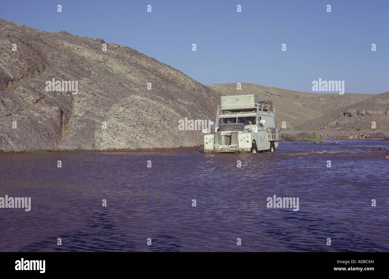 0518 22 Land Rover Series IIA one ton in river north of Herat Afghanistan Asia The river is the only road Stock Photo
