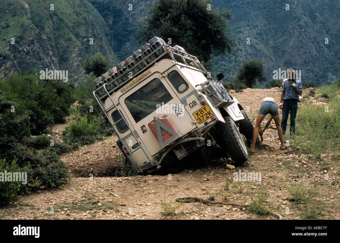 0533 02 Land Rover Series IIA one ton model in ditch Swat Valley Northwest Pakistan Asia Indian Subcontinent Stock Photo