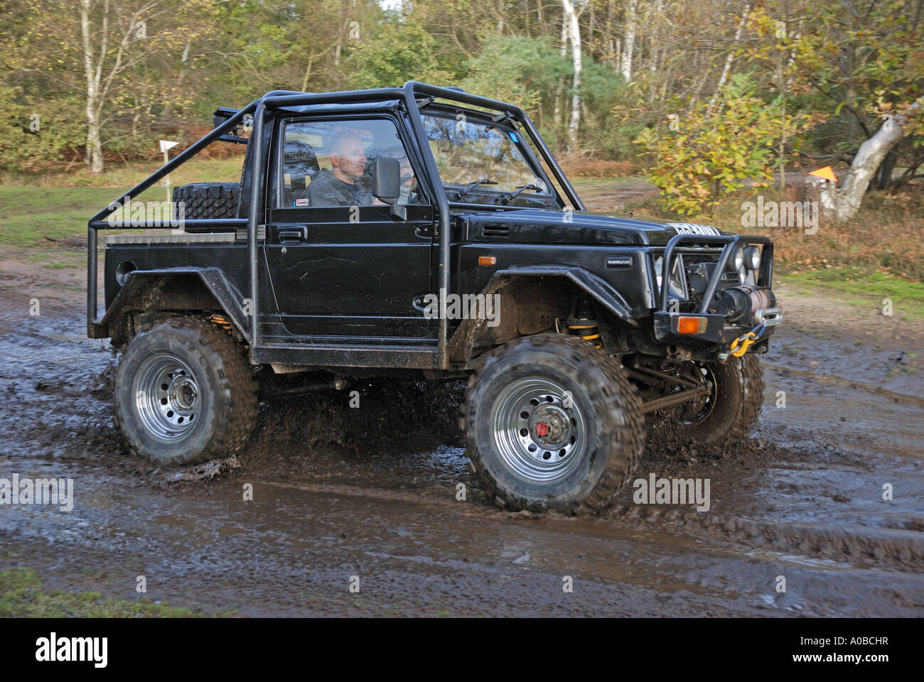 D0001009w Suzuki Samurai based trialler with roll cage alloy wheels raised supension winch free wheeling hubs and 4WD Stock Photo
