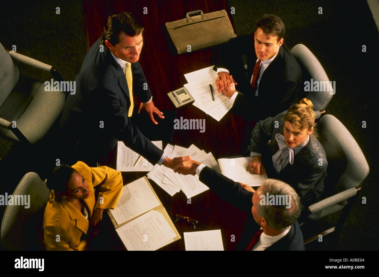 Business executives closing the deal Stock Photo