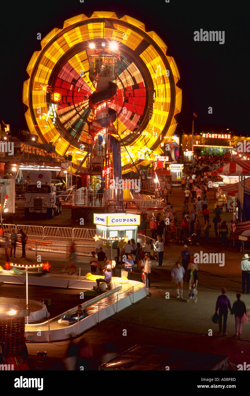 Carnival rides at twilight at Cheyenne Frontier Days in Cheyenne WY Stock Photo