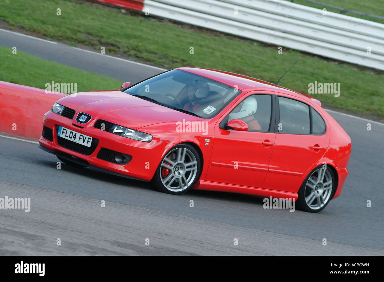 Red Seat Leon Cupra 2004 car on race track in the uk Stock Photo