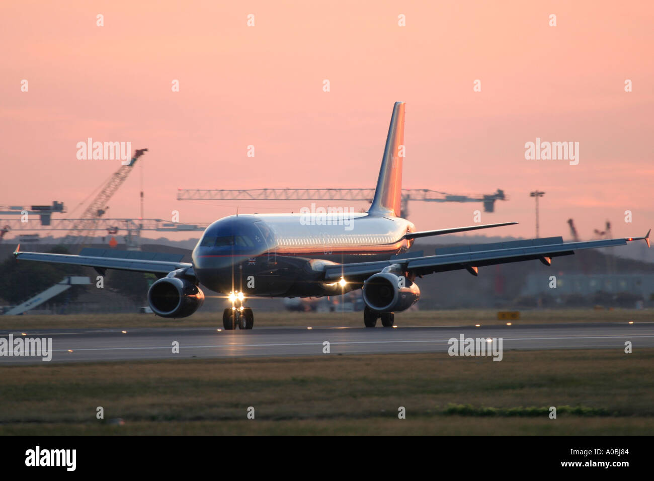 Airbus A320 BMI on runway at London Heathrow Airport UK Stock Photo Alamy