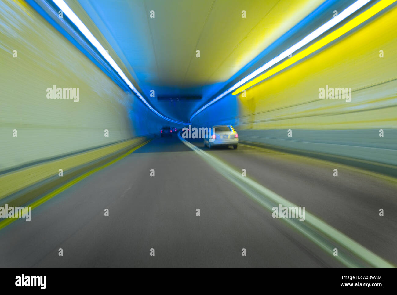 Cars Trucks & Lorries Speeding On Highway And Through Tunnel, USA Stock Photo