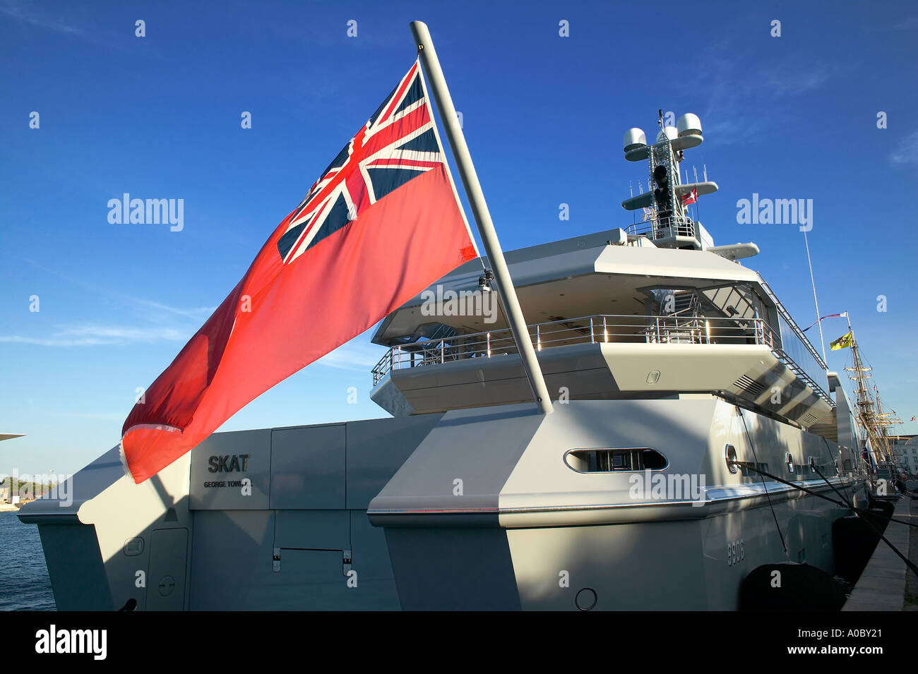 British red Ensign flag on 'Skat' luxury yacht moored in Copenhagen harbour, Denmark Europe Stock Photo