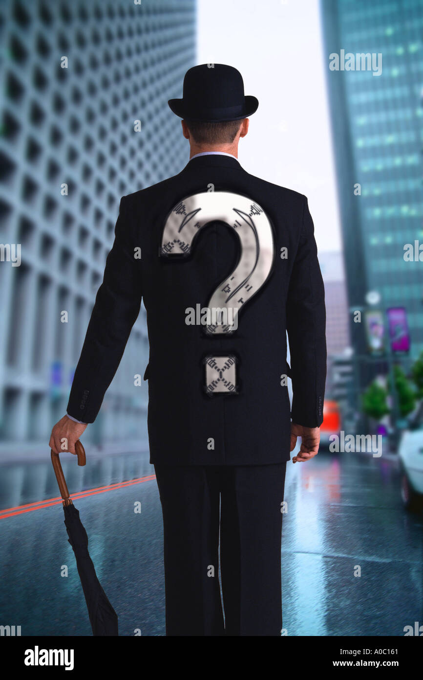 Businessman with question mark in back Stock Photo - Alamy