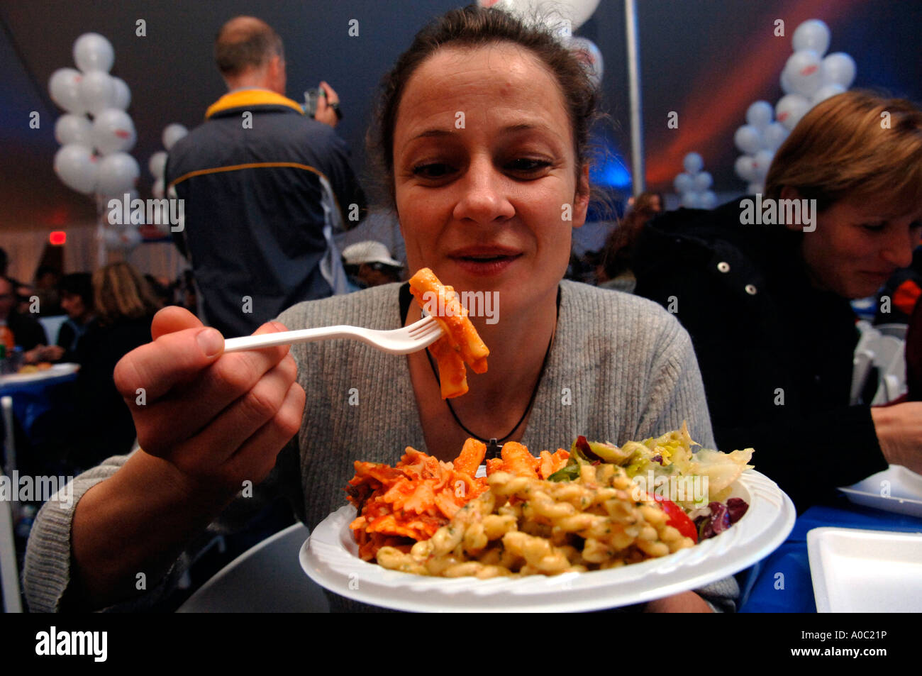 NYC Marathon runners chow down on pasta Stock Photo - Alamy