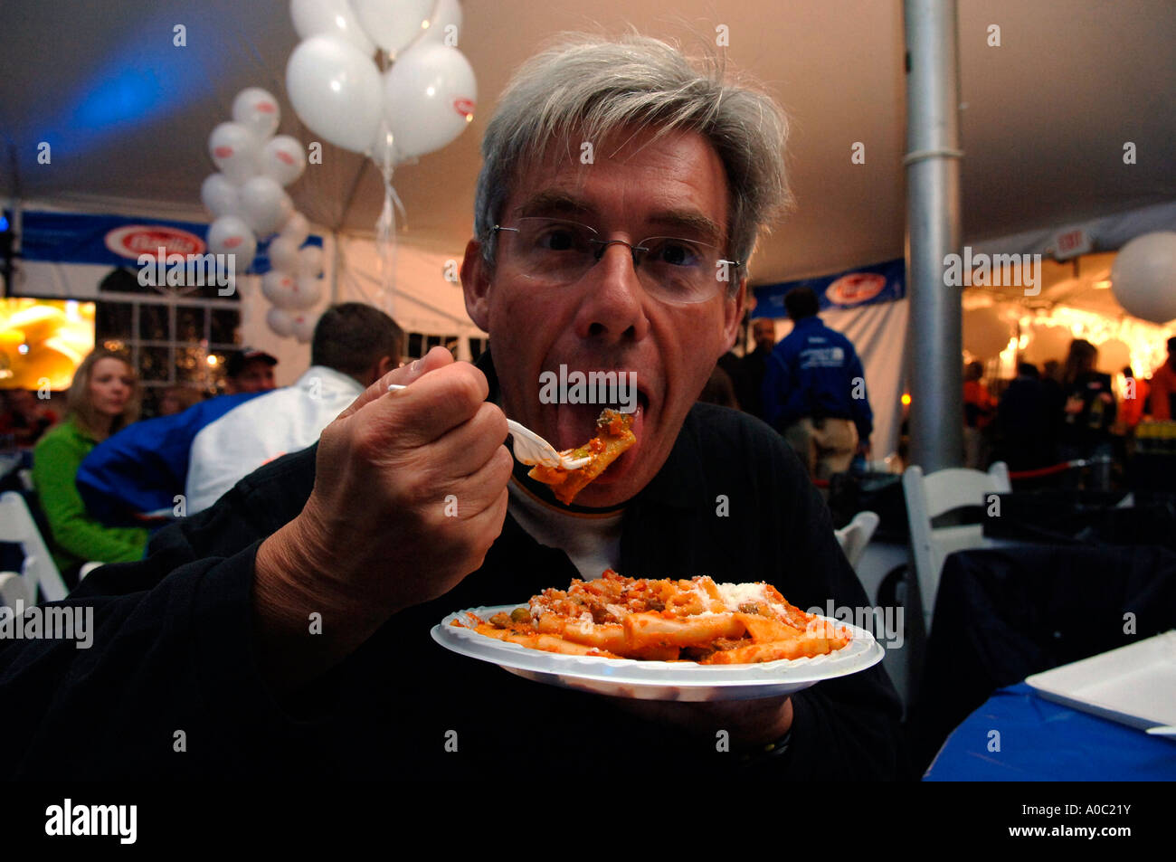 NYC Marathon runners chow down on pasta Stock Photo - Alamy