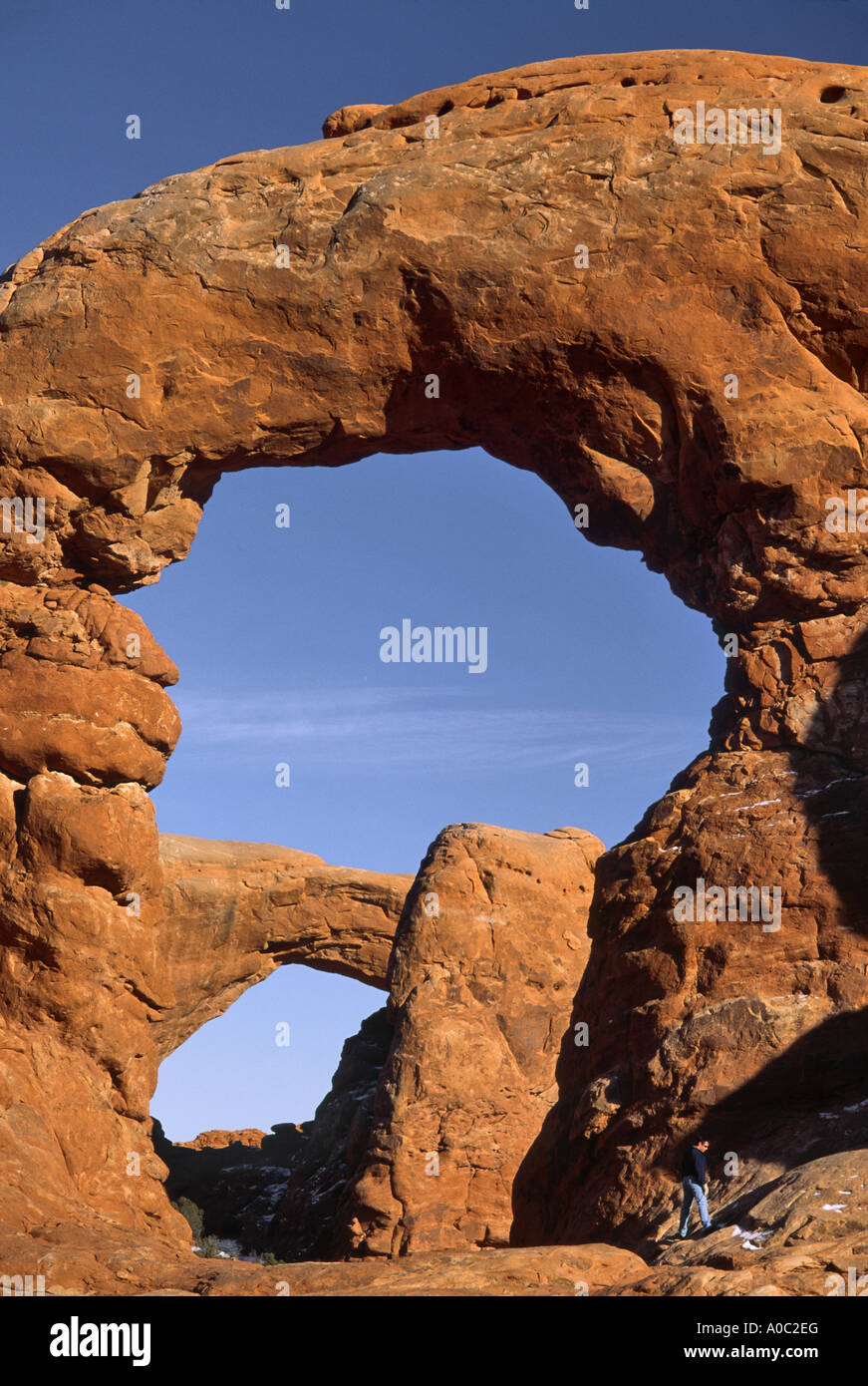 Turret Arch, South Window in dist, winter, Arches Nat Park, Utah, USA Stock Photo