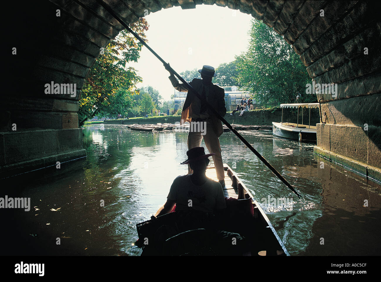 Punting under Magdalen Bridge, Oxford Stock Photo