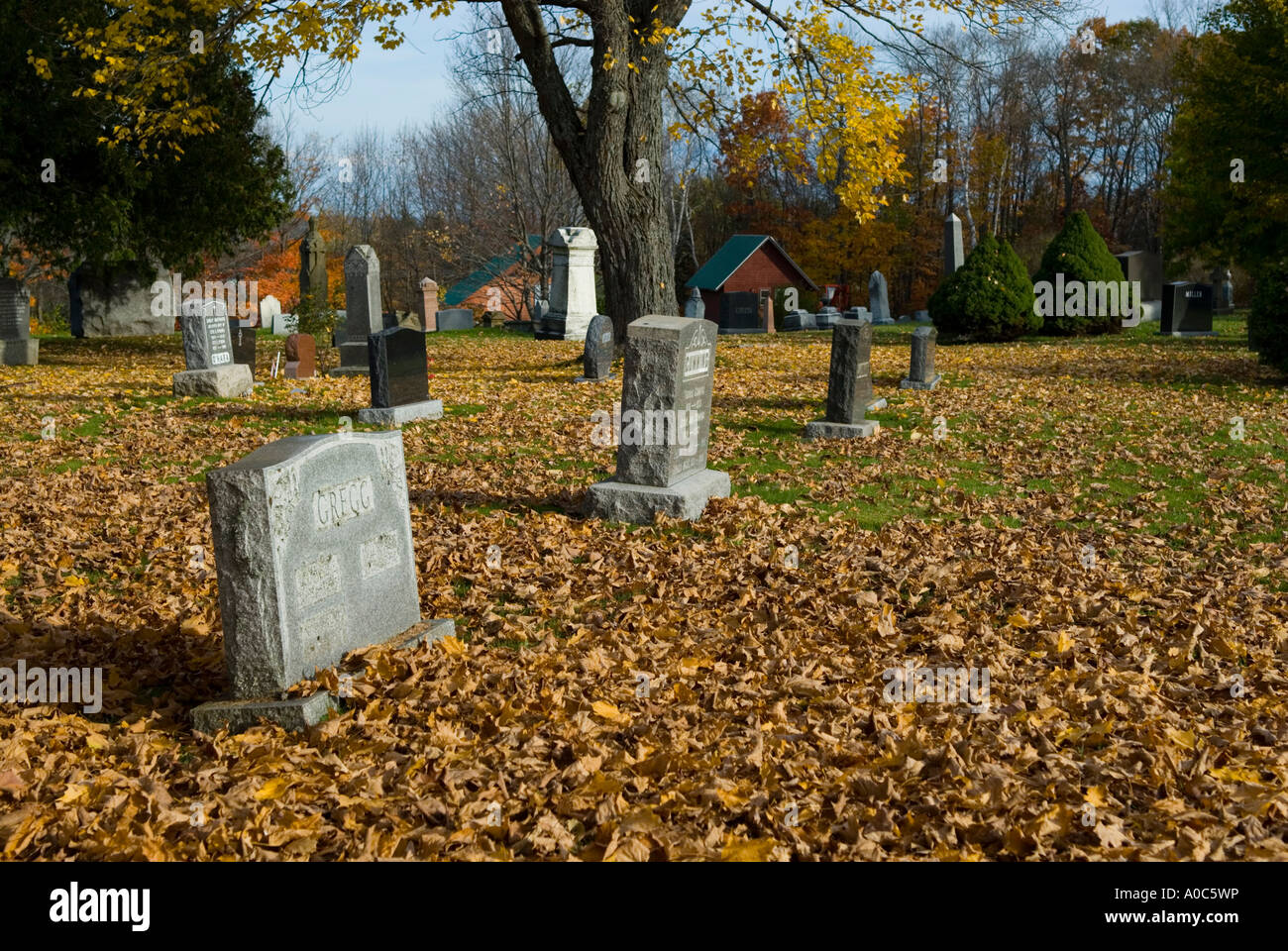 Stock image of a cemetery with fall foliage colours Stock Photo - Alamy