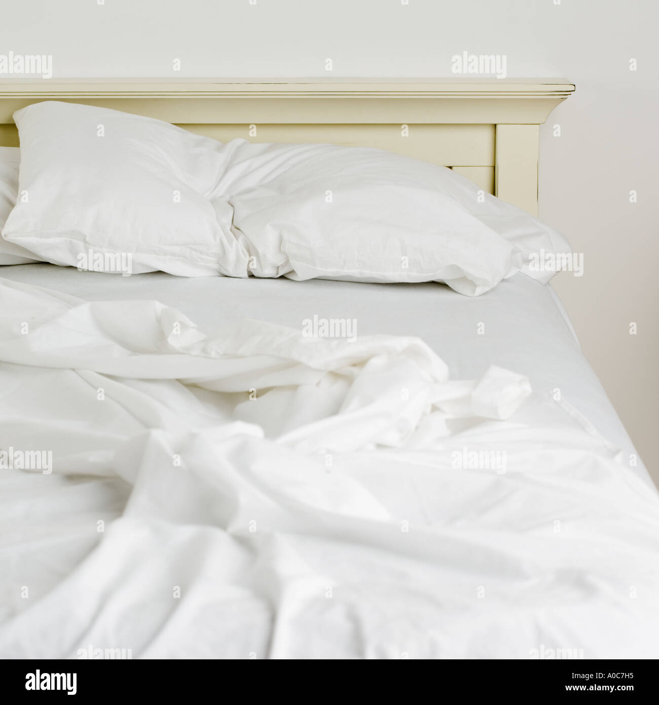 Still life of an unmade bed Stock Photo