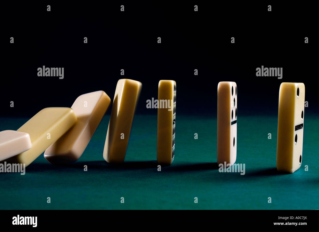 Dominoes falling with motion blur hi-res stock photography and images ...