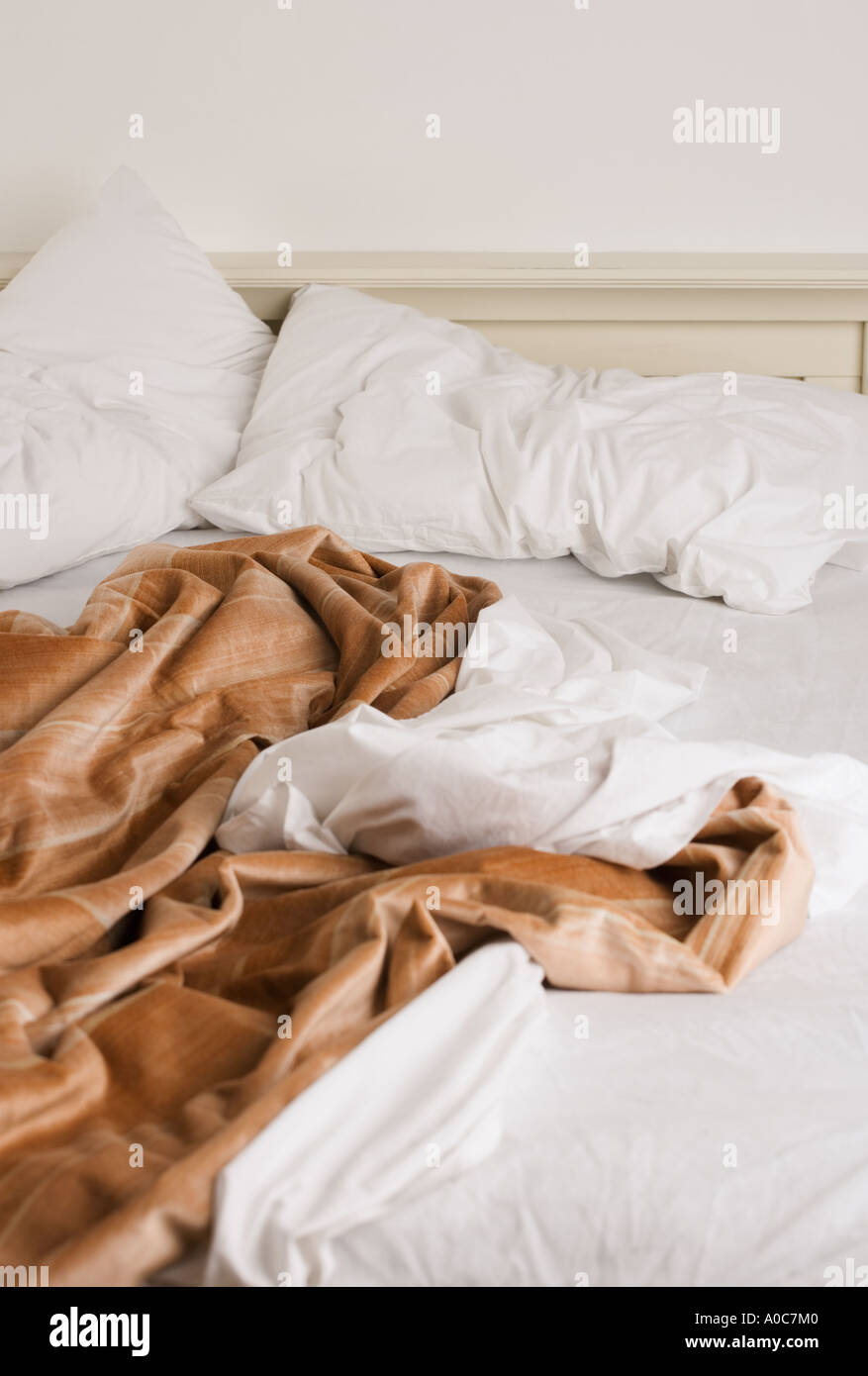 Still life of unmade bed Stock Photo