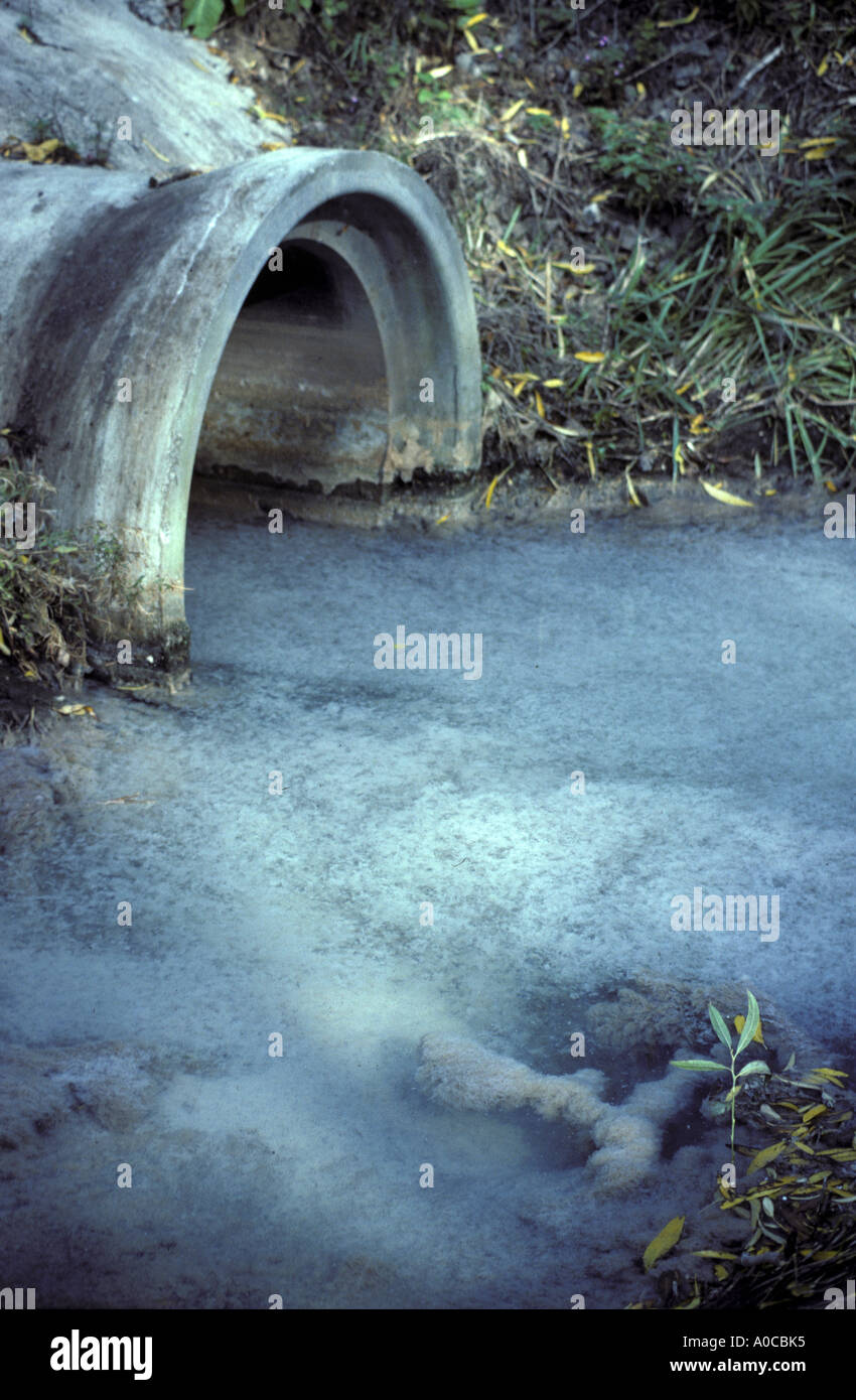 Tiny particles of paper smother a river in Lydney Gloucestershire England. Factory is now closed Stock Photo
