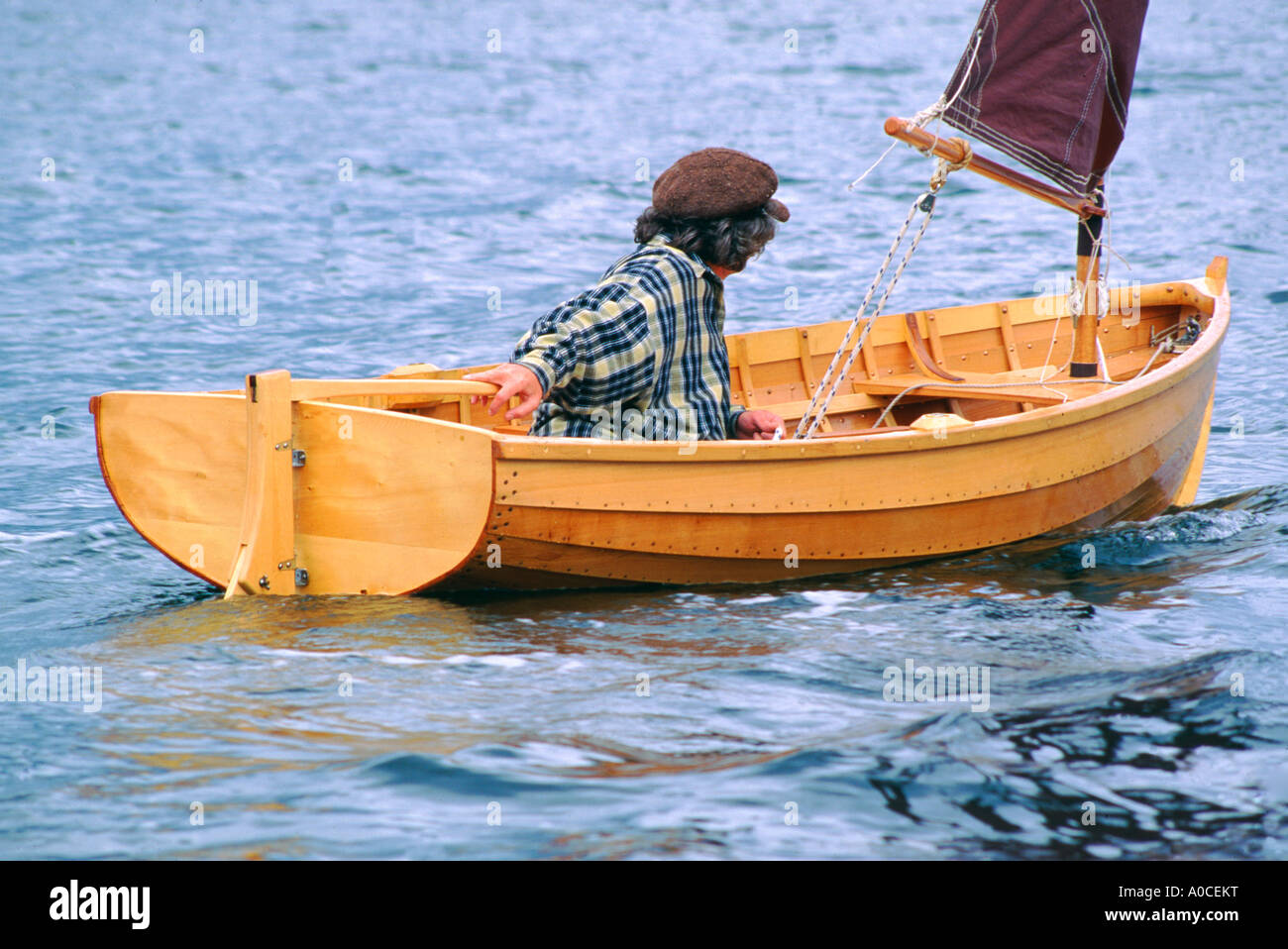 Wooden sailing dinghy hi-res stock photography and images - Alamy