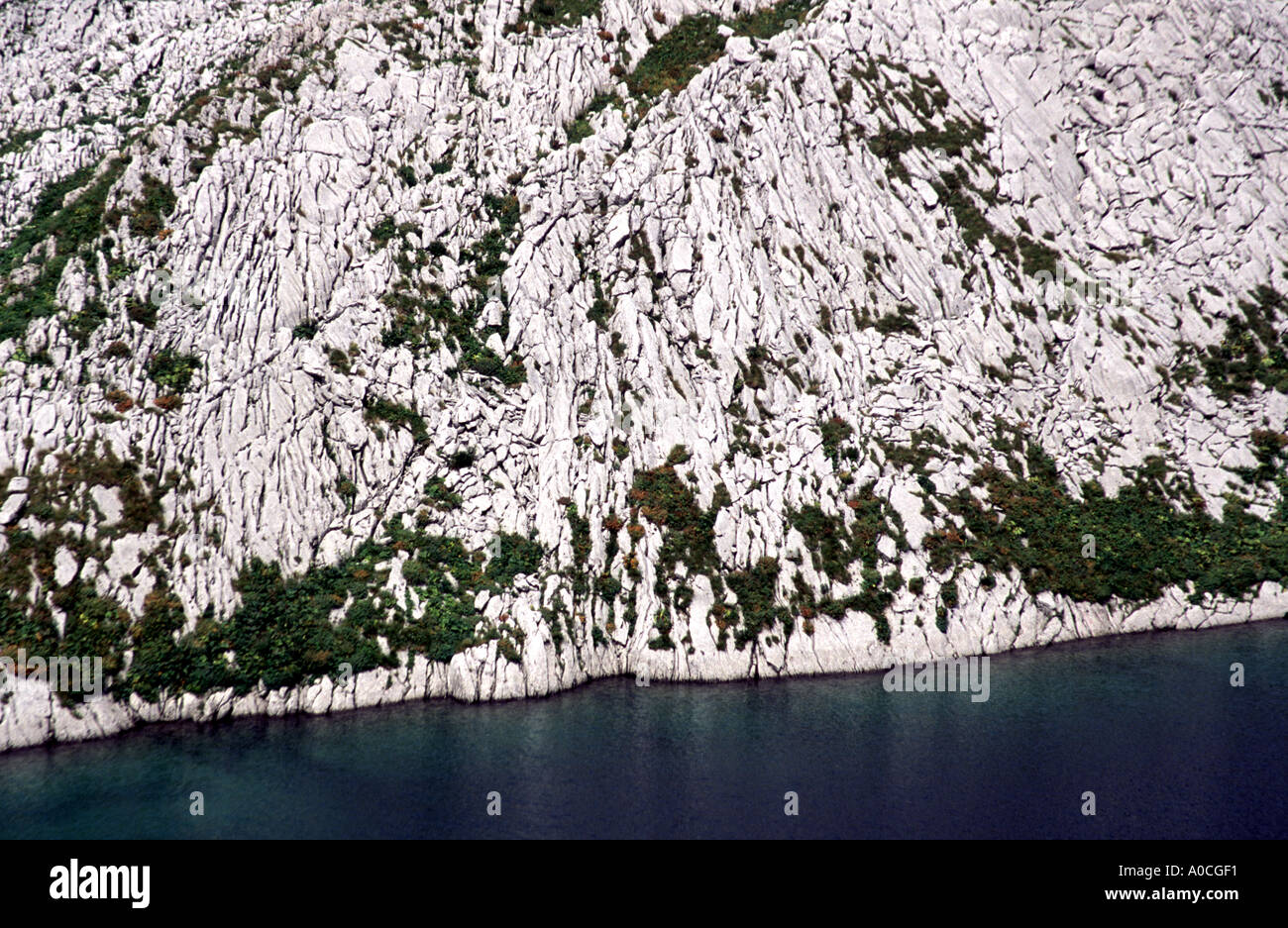 White limestone cliffs of Great Lake the largest and deepest of the