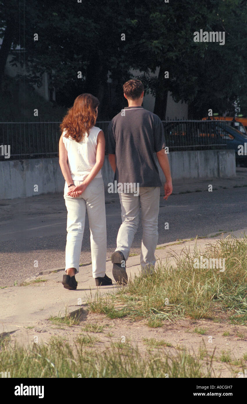 Walking down a sidewalk hi-res stock photography and images - Alamy