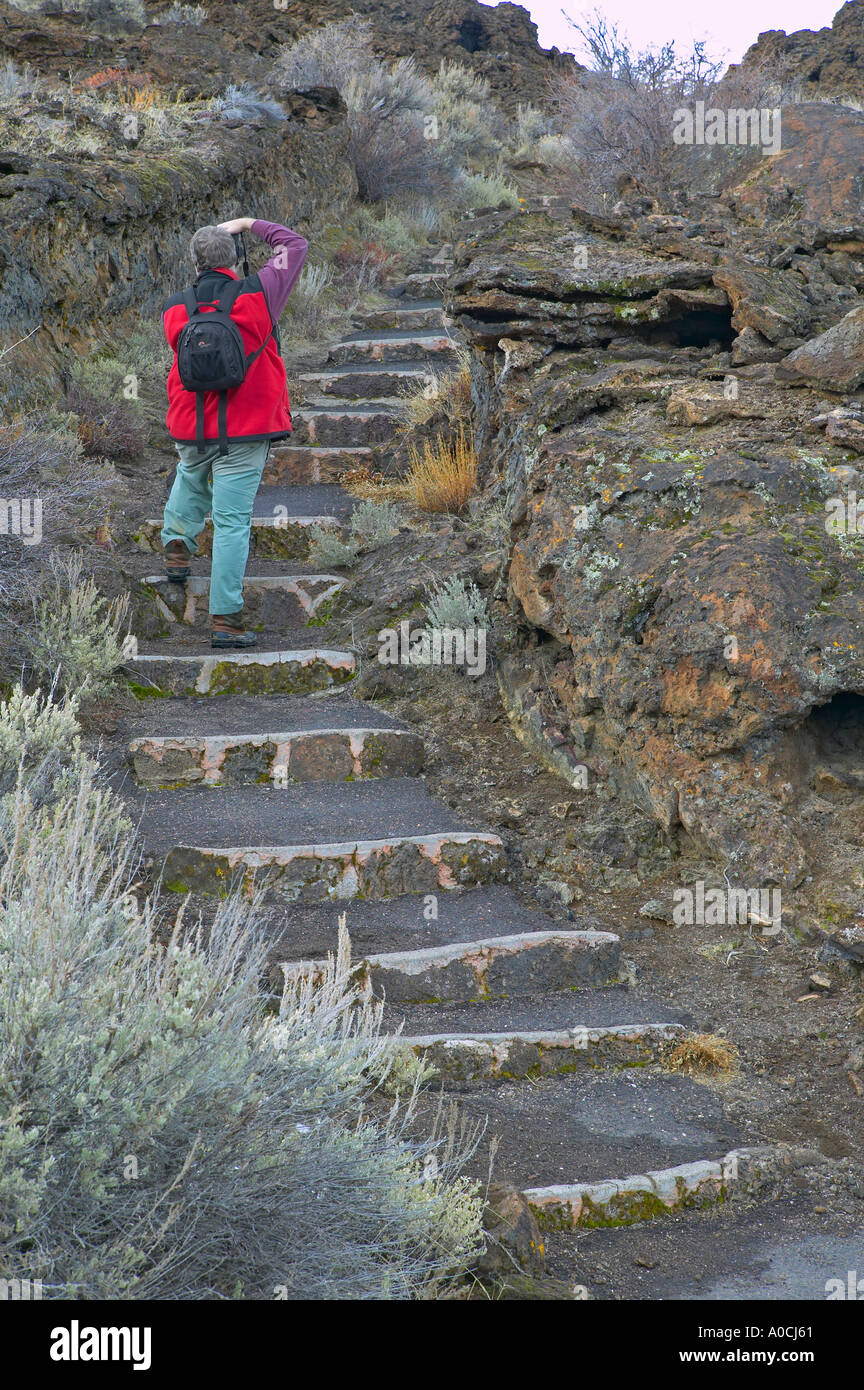 Steps in lava flow in park with photographer Tule Lake National Wildlife Refuge California Stock Photo