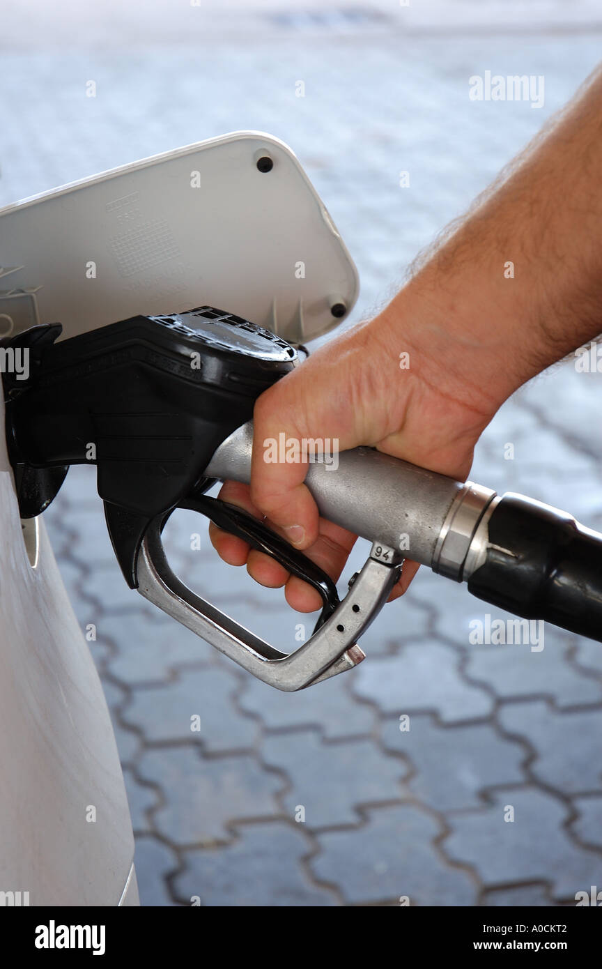Pumping petrol in a car Stock Photo Alamy