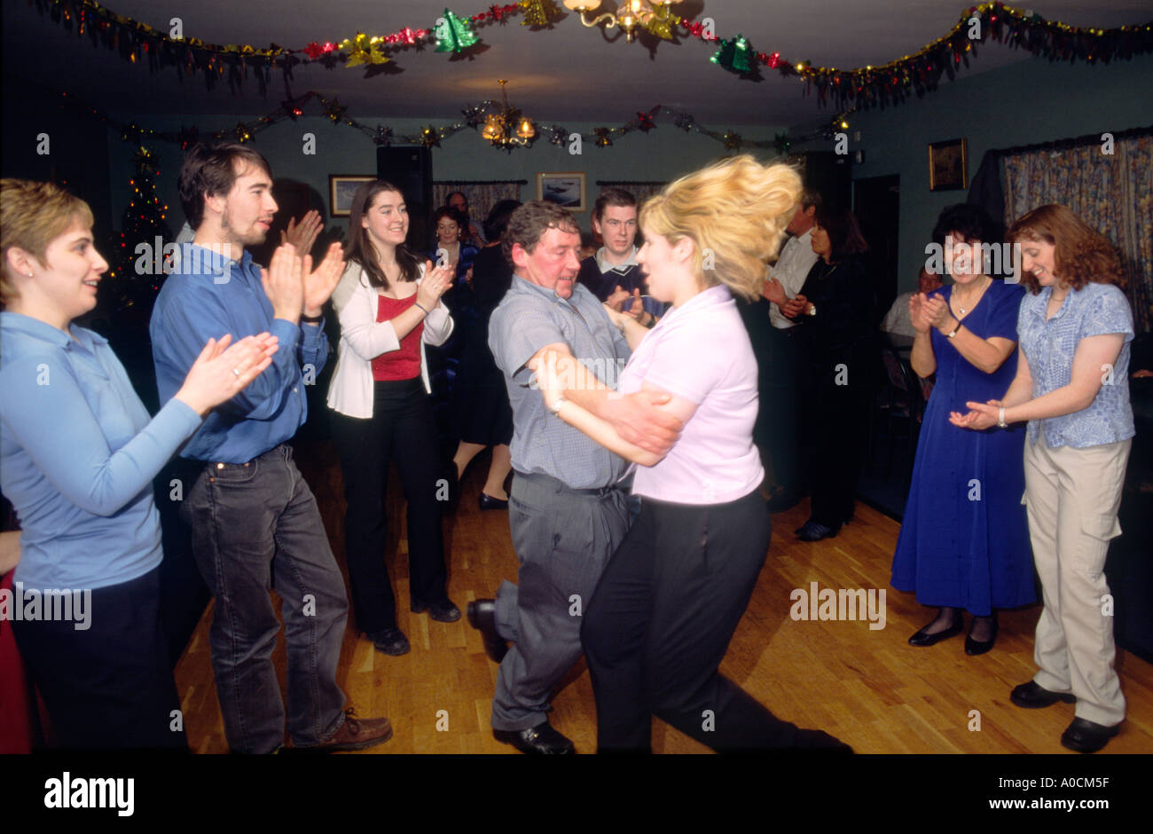 Annual Christmas dance party ceilidh in the pub on Rathlin Island off the Giants Causeway Coast, County Antrim, Northern Ireland Stock Photo