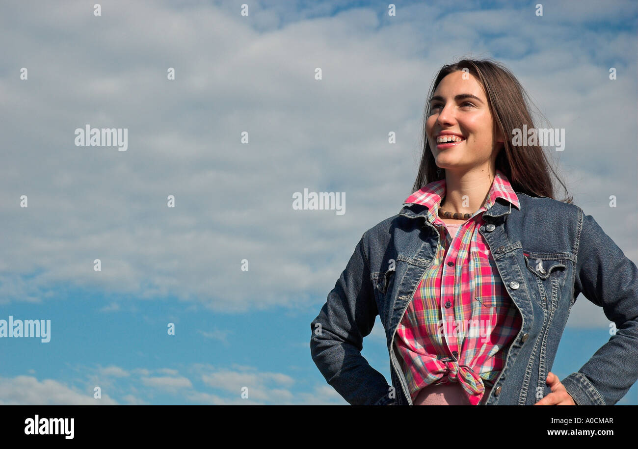 Smiling young woman outdoors Stock Photo