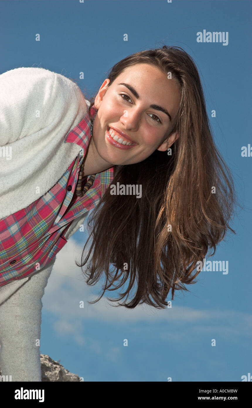 Smiling young woman outdoors Stock Photo