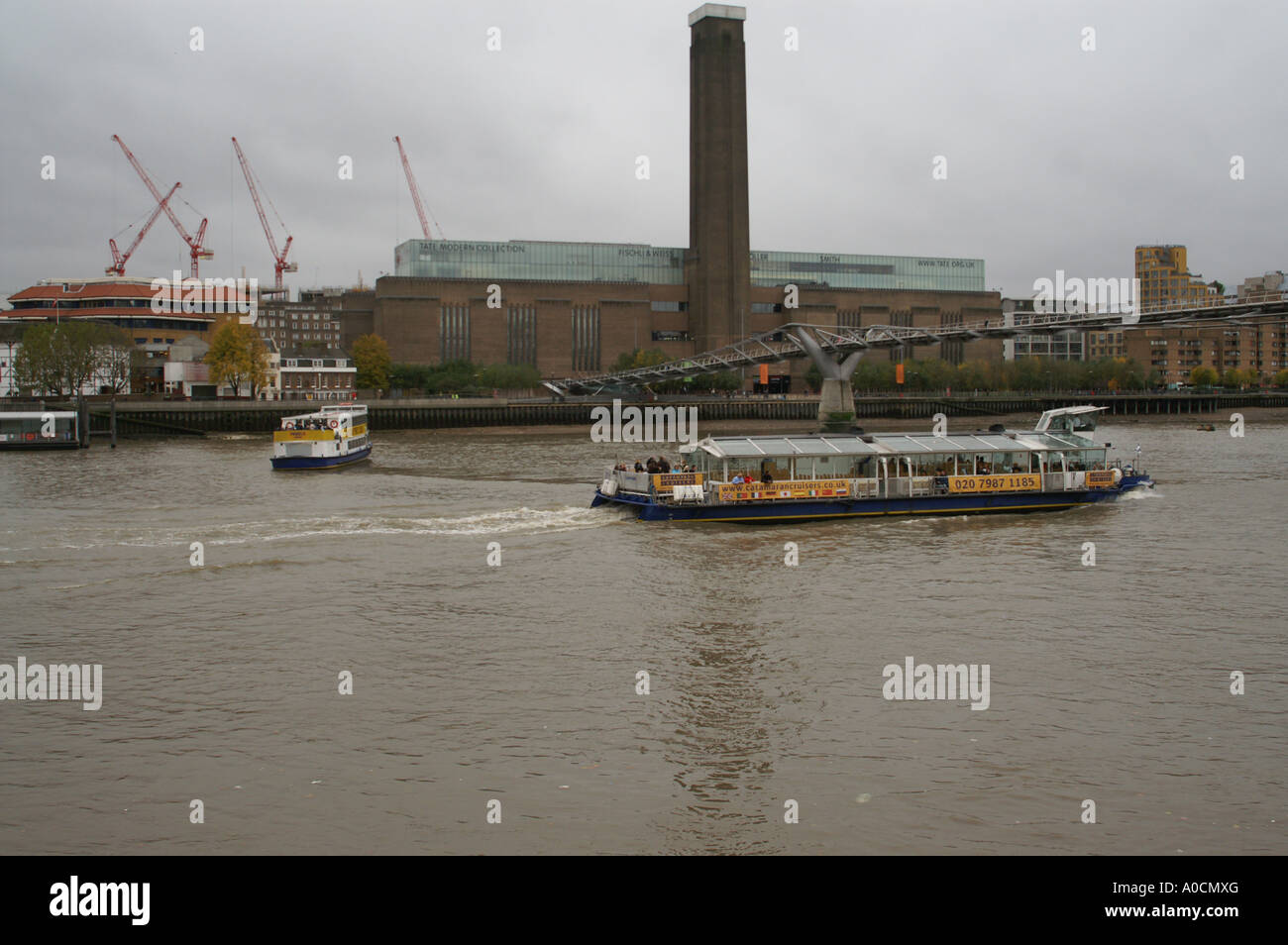 Tourist boats near Millenium bridge wobbly London Stock Photo