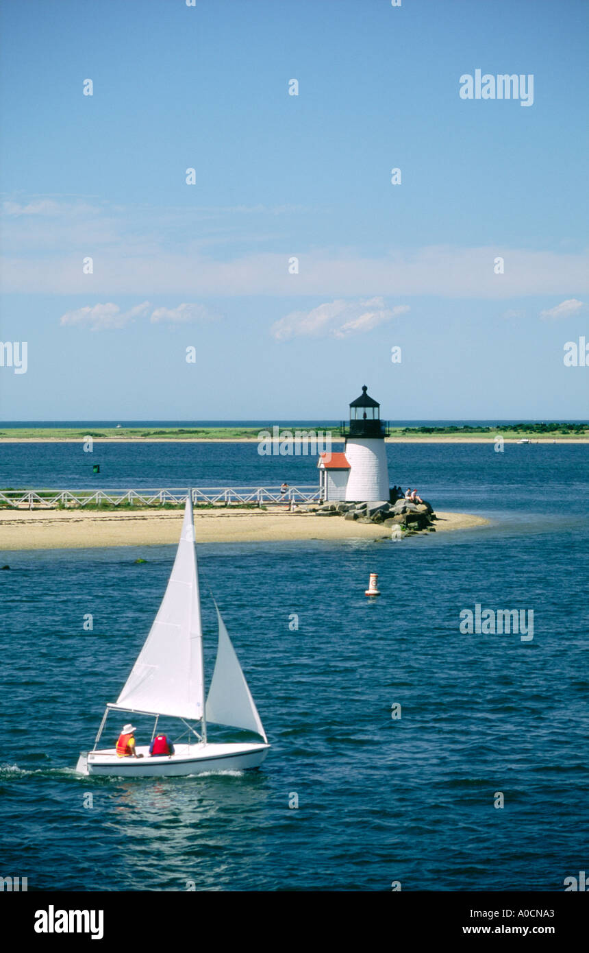 Sail boat leaving Nantucket Harbor off Cape Cod, Massachusetts, USA