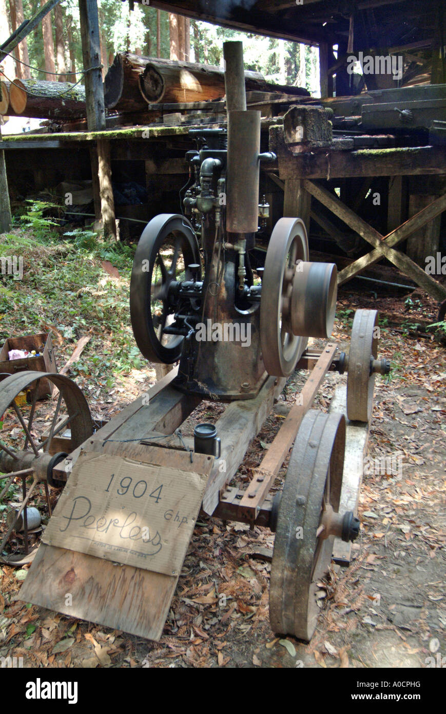 1904 antique Peerless 6 horsepower engine on an antique cart at a saw