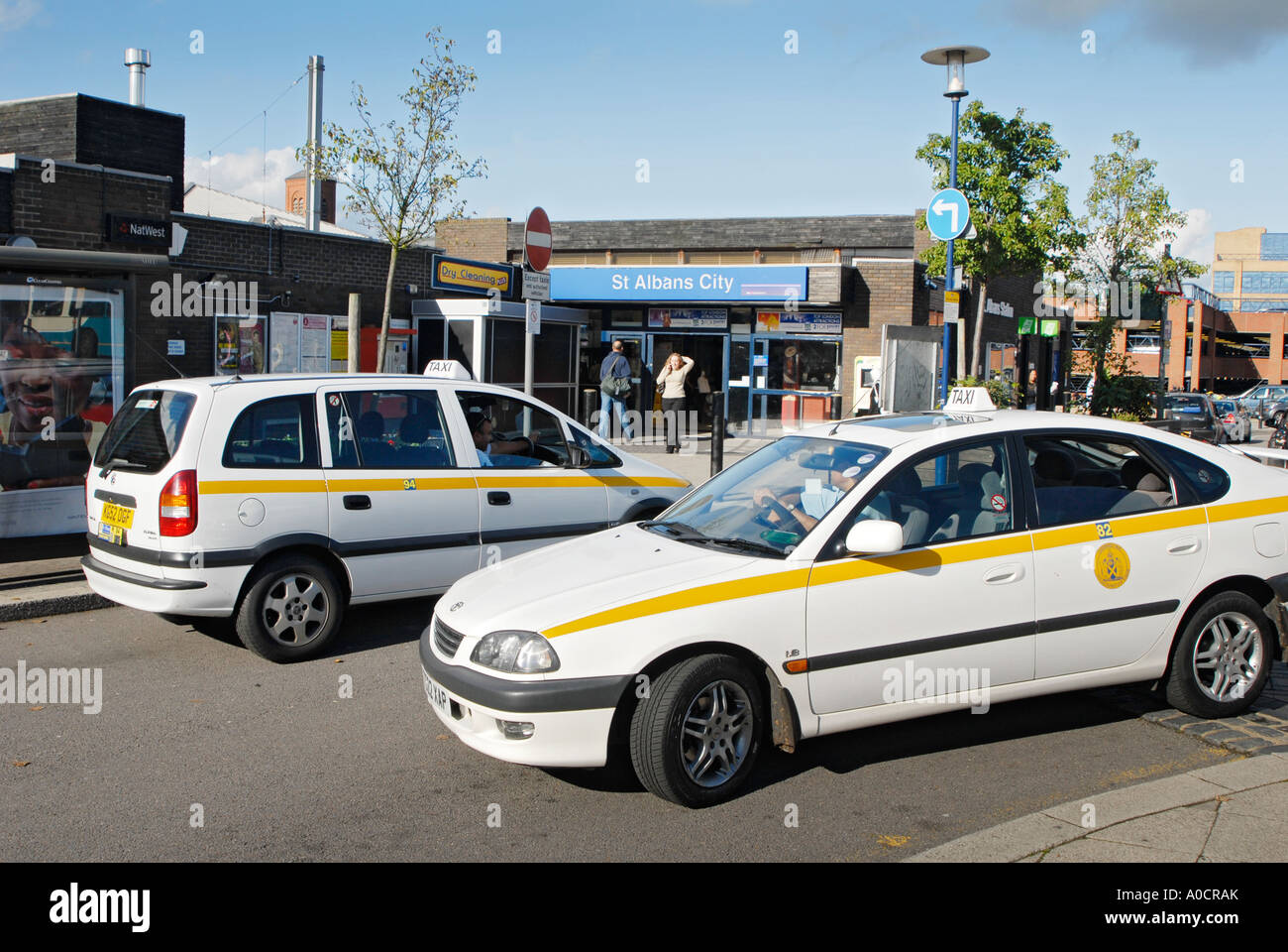 Taxi cabs waiting outside St Albans railway station, england Stock