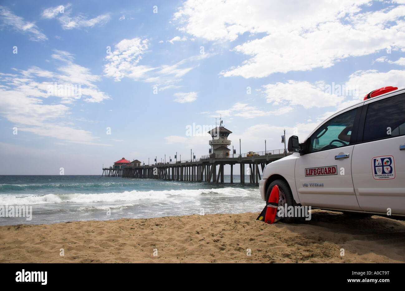 Lifeguard truck with pier in the background, Huntington Beach, California, USA (July 2006) Stock Photo