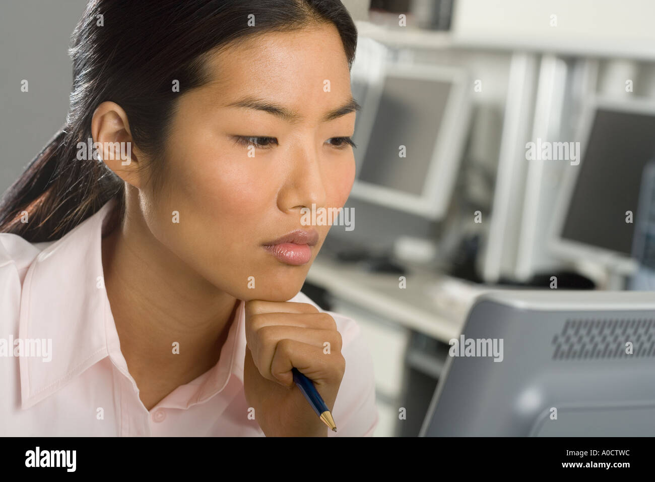 Businesswoman working at computer Stock Photo