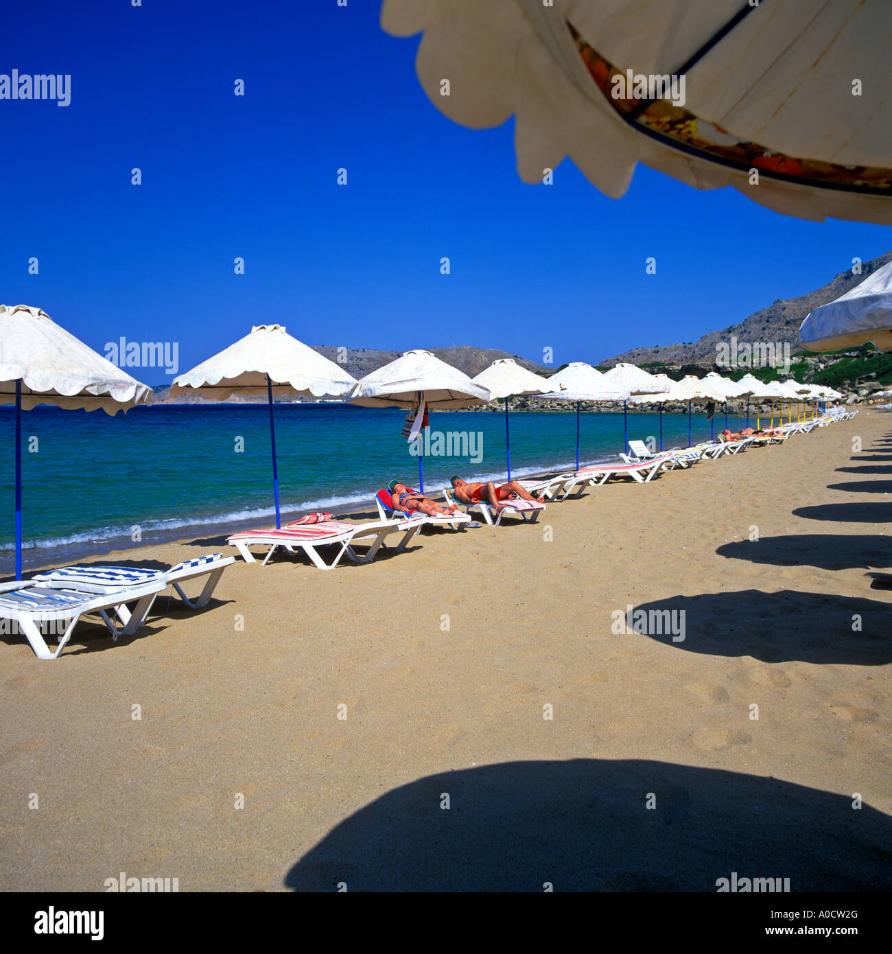 EARLY MORNING ON PEFKOS BEACH RHODES BEFORE THE TOURISTS ARRIVE Stock Photo