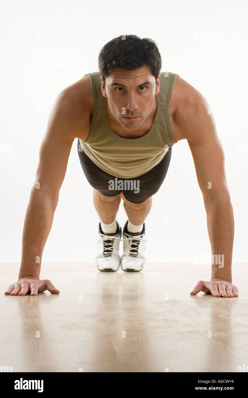 Man doing pushups Stock Photo