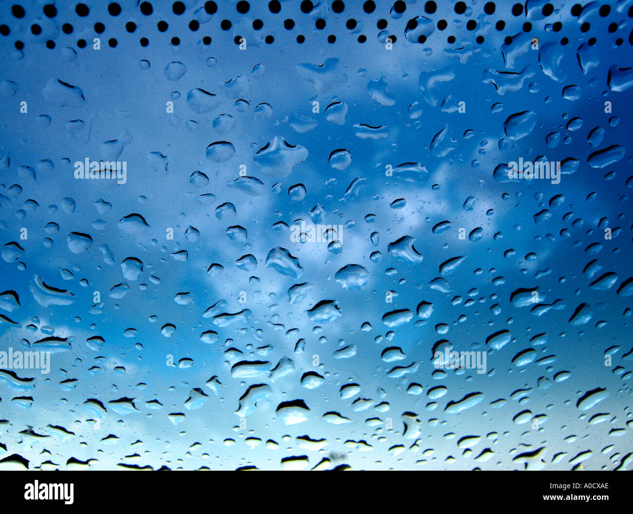 Raindrops on car windshield Stock Photo - Alamy