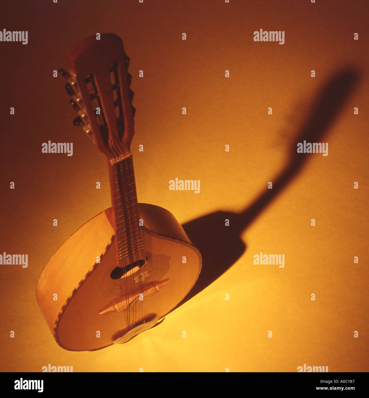 Still Life of a Mandolin in a Pool of Light Stock Photo