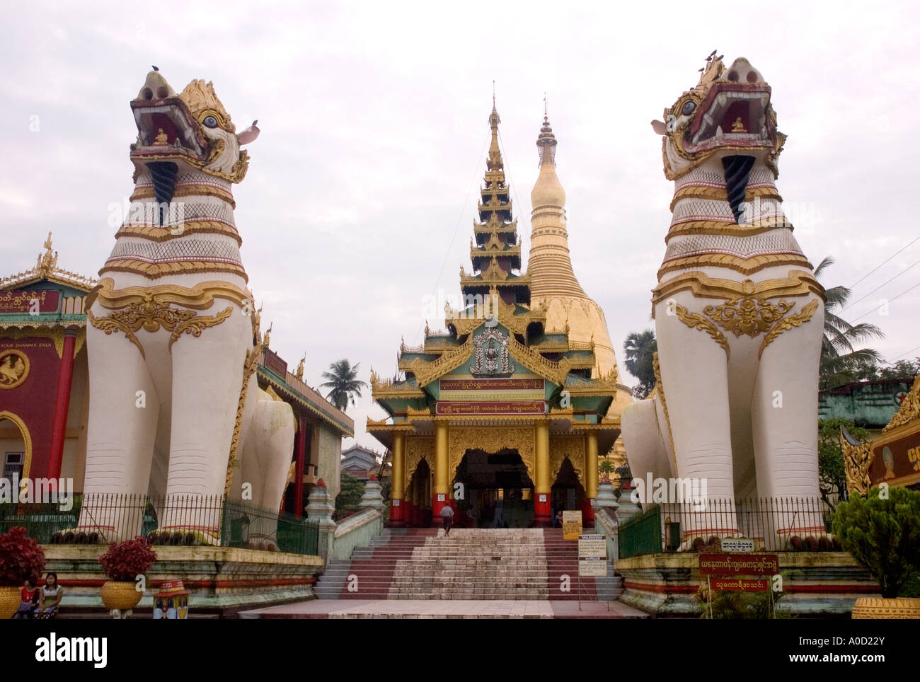 Stock photograph of two chinthe guarding the Shwemawdaw Paya at Bago in Myanmar Stock Photo