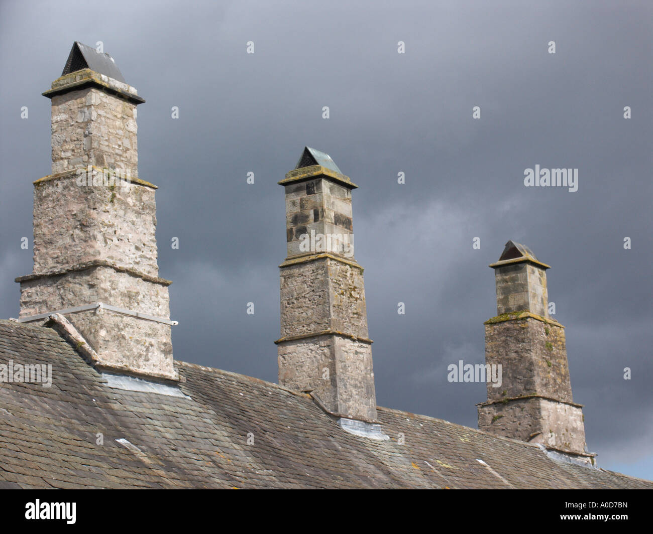 3 chimneys with covers to prevent bird nests Stock Photo Alamy