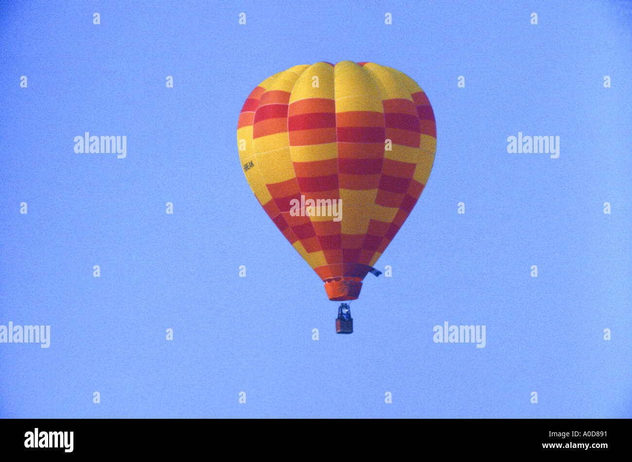 HOT AIR BALLOON IN THE AIR BLUE SKY Stock Photo - Alamy