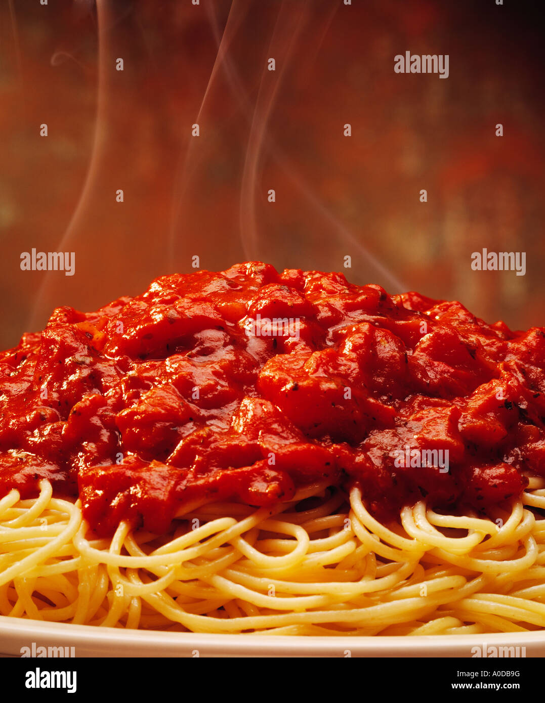 Close up of a plate of spagetti with hot meat sauce steaming Stock Photo