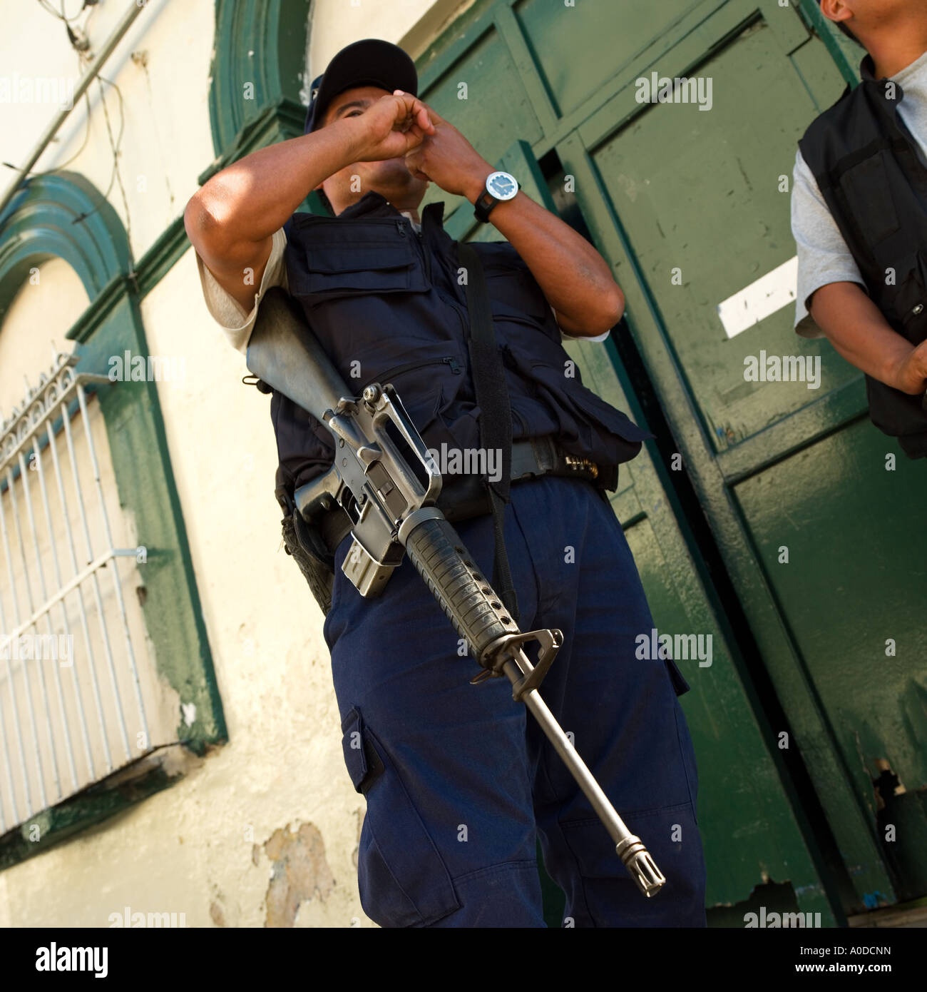 Mexican Police with armalite M16 rifle no model release required: crop makes people unrecognisable Stock Photo