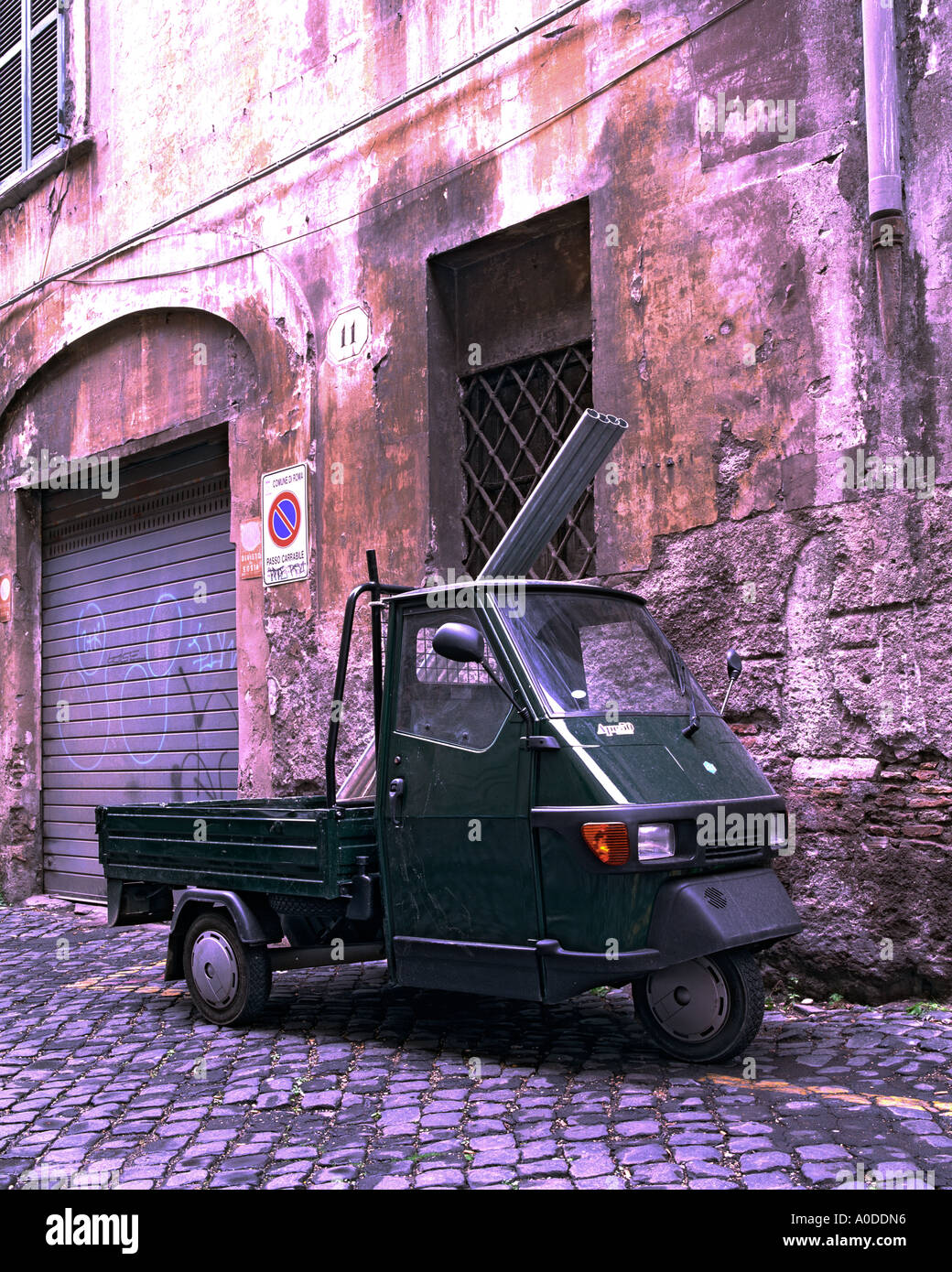 Piaggio pickup van in cobbled sidestreet Rome, Italy, Europe Stock Photo