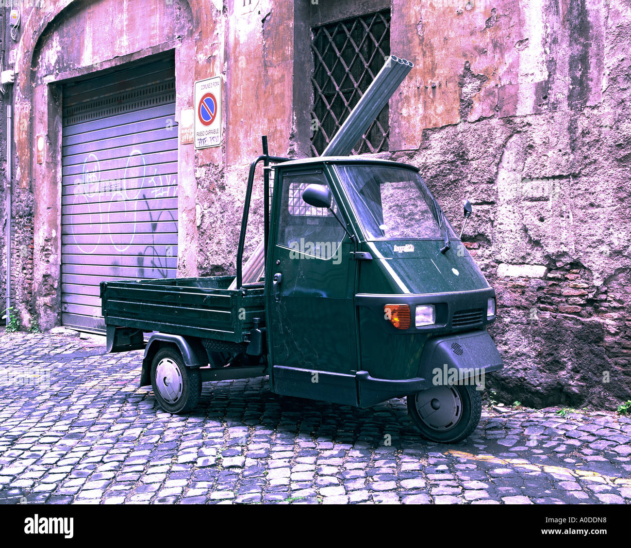 Piaggio pickup van in cobbled sidestreet Rome, Italy, Europe Stock Photo