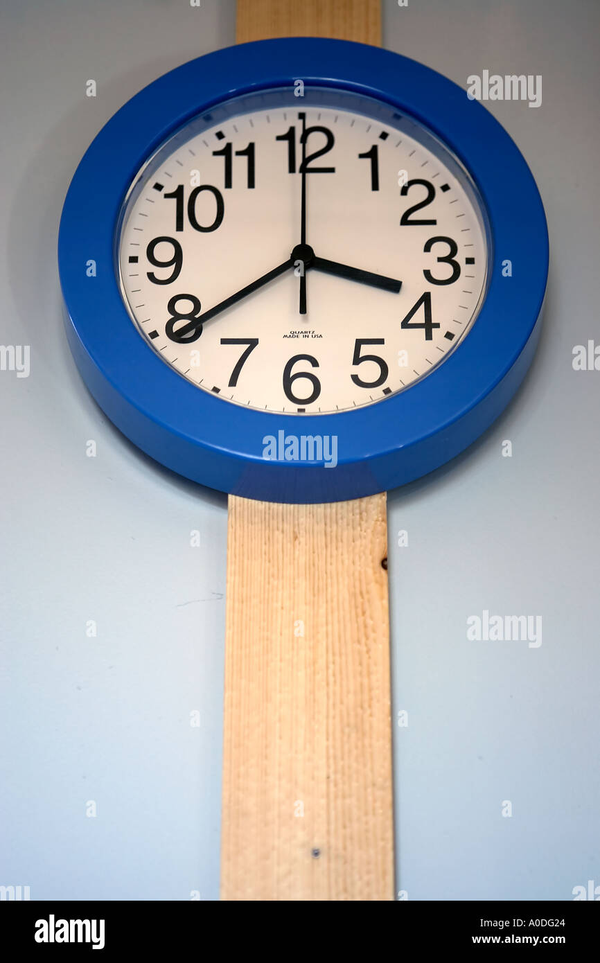 Blue wall clock hi-res stock photography and images - Alamy